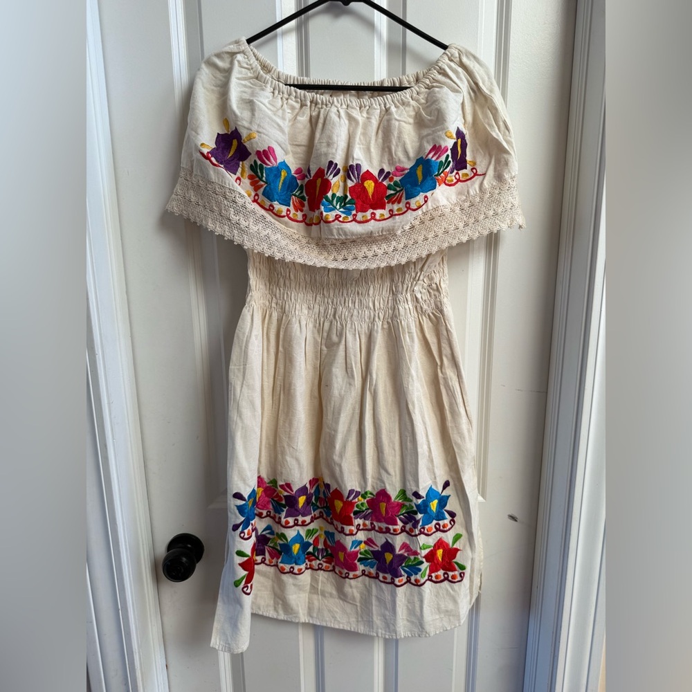 traditional Mexican off-the-shoulder dress colorful embroidered floral design